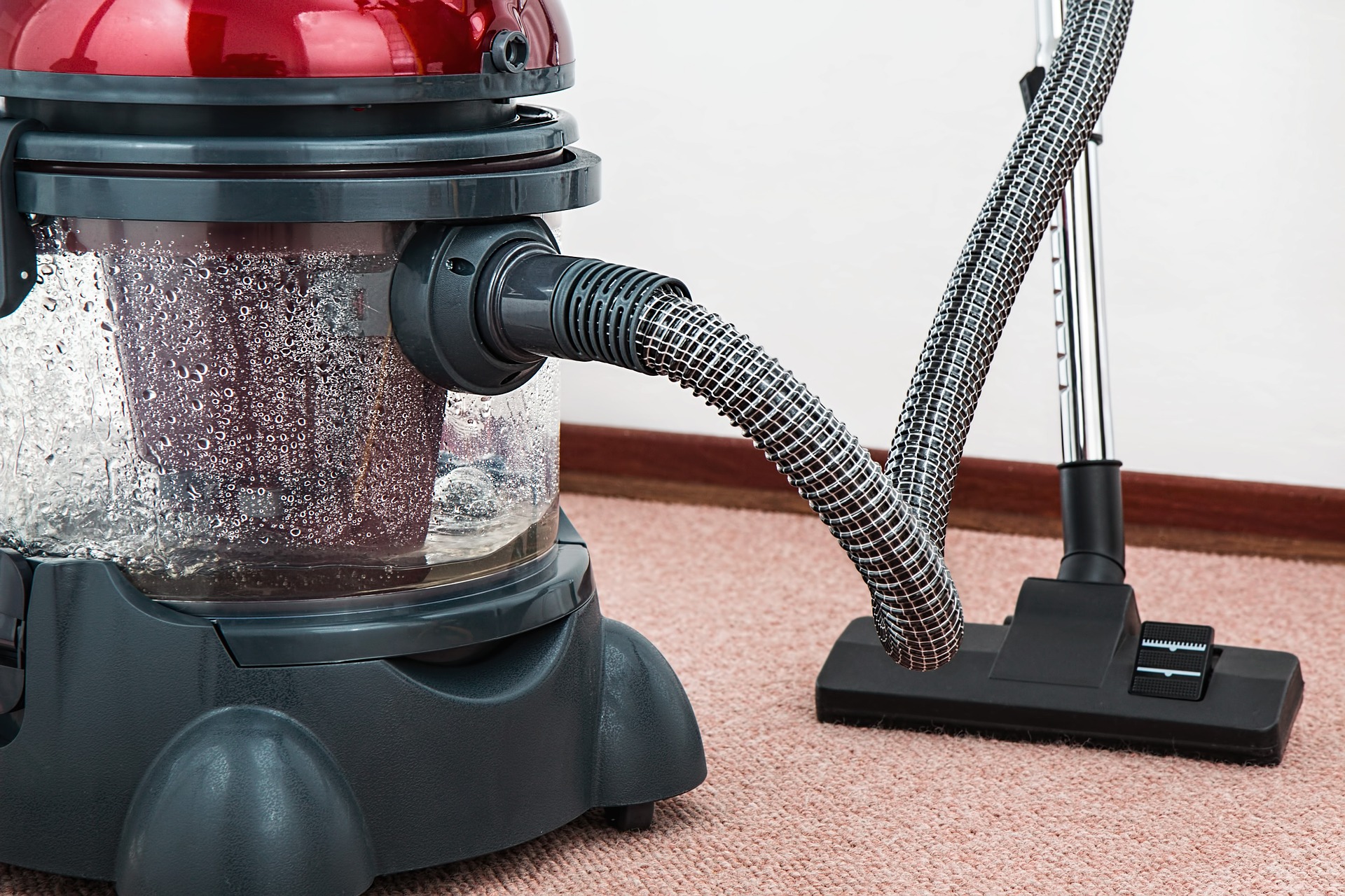 Modern office with rows of desks and monitors, the kind of space covered by our commercial cleaning Swansea service.