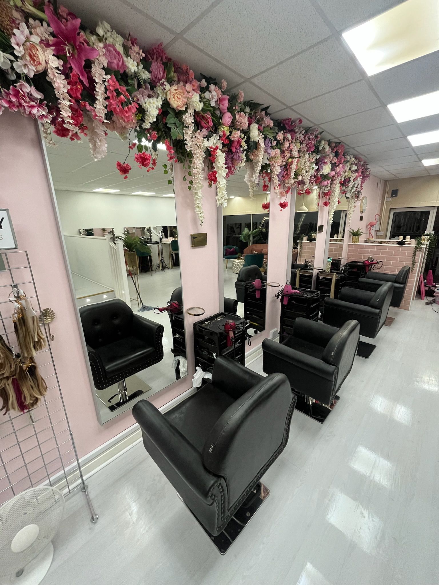 Clean hair salon floor and styling stations after professional cleaning